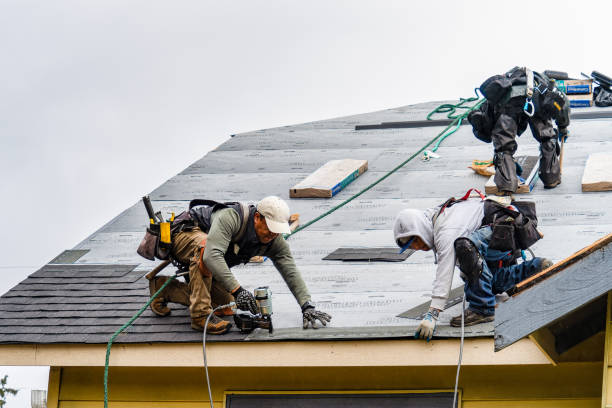Professional Gutter Installation technician working in Fayette, MO